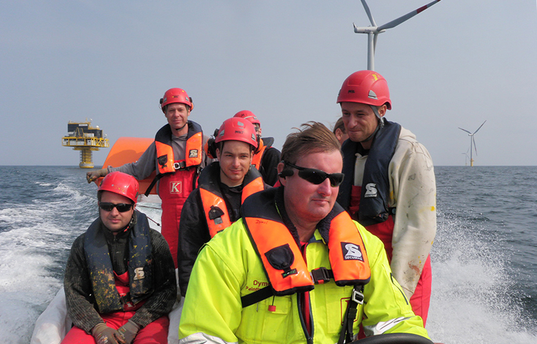 Krebs personnel in a boat 