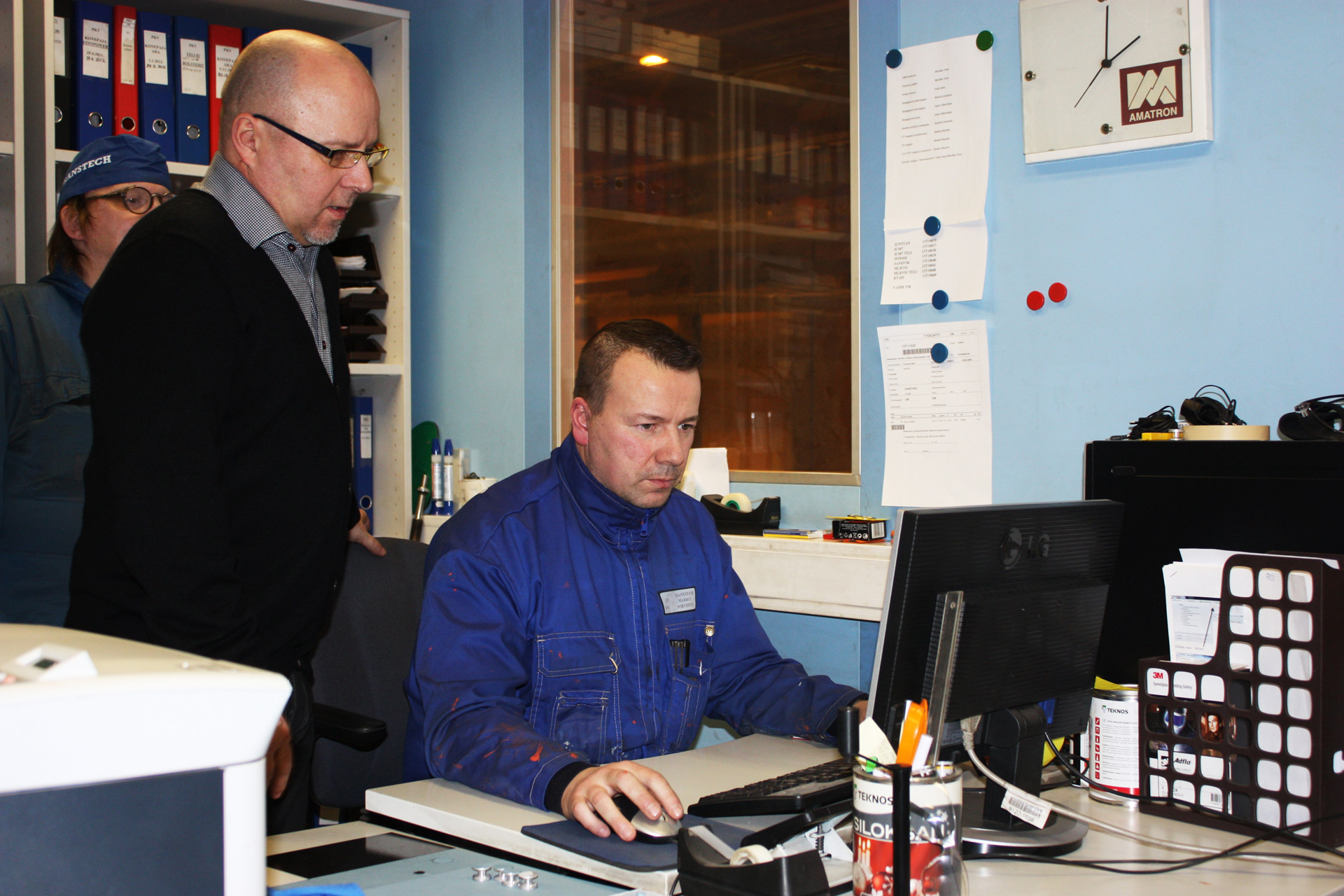 Surface Treatment Quality Inspector Marko Sorvisto checks the surface treatment reports carefully.